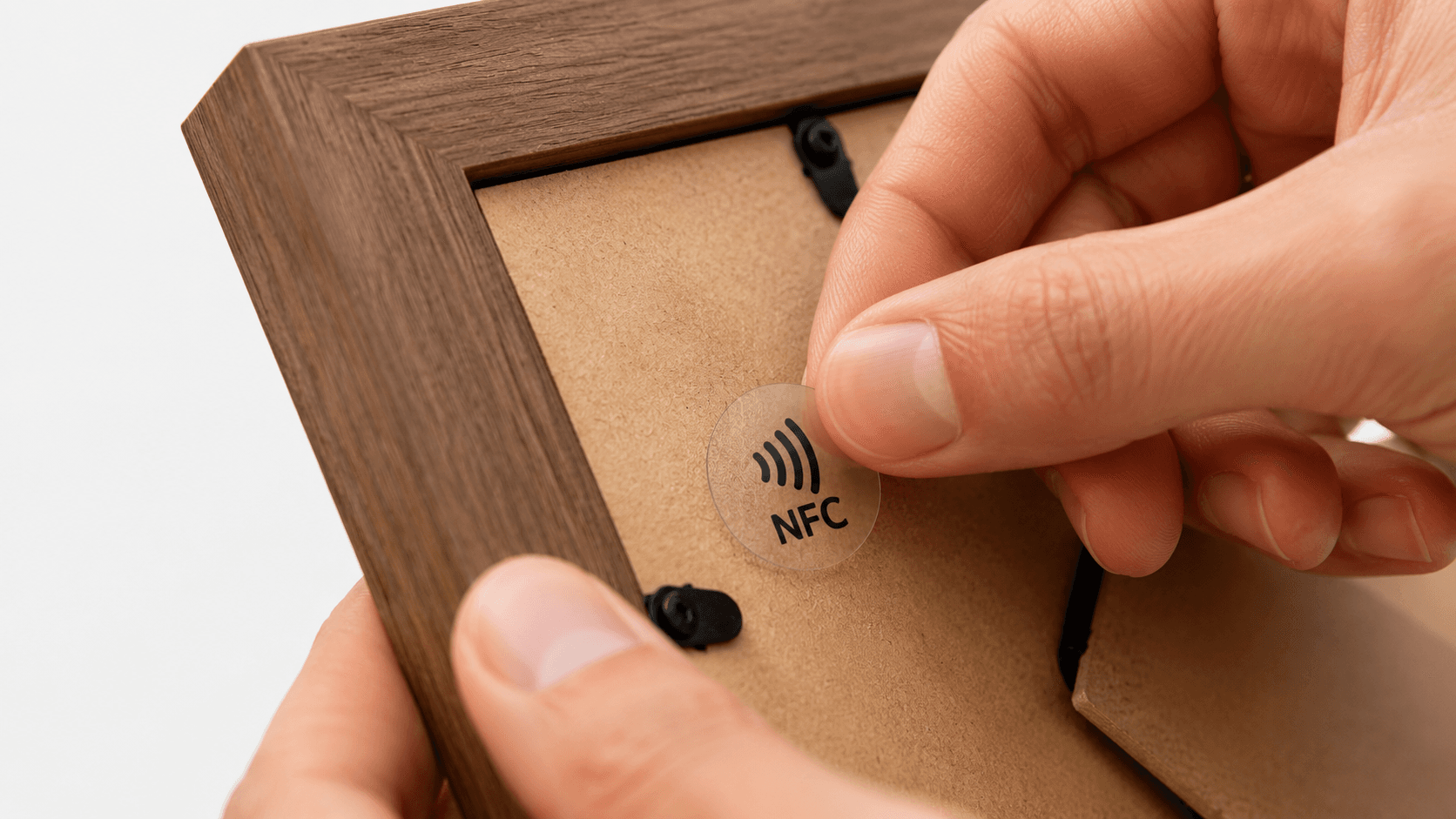 Sticking NFC tag on the back of a photo frame